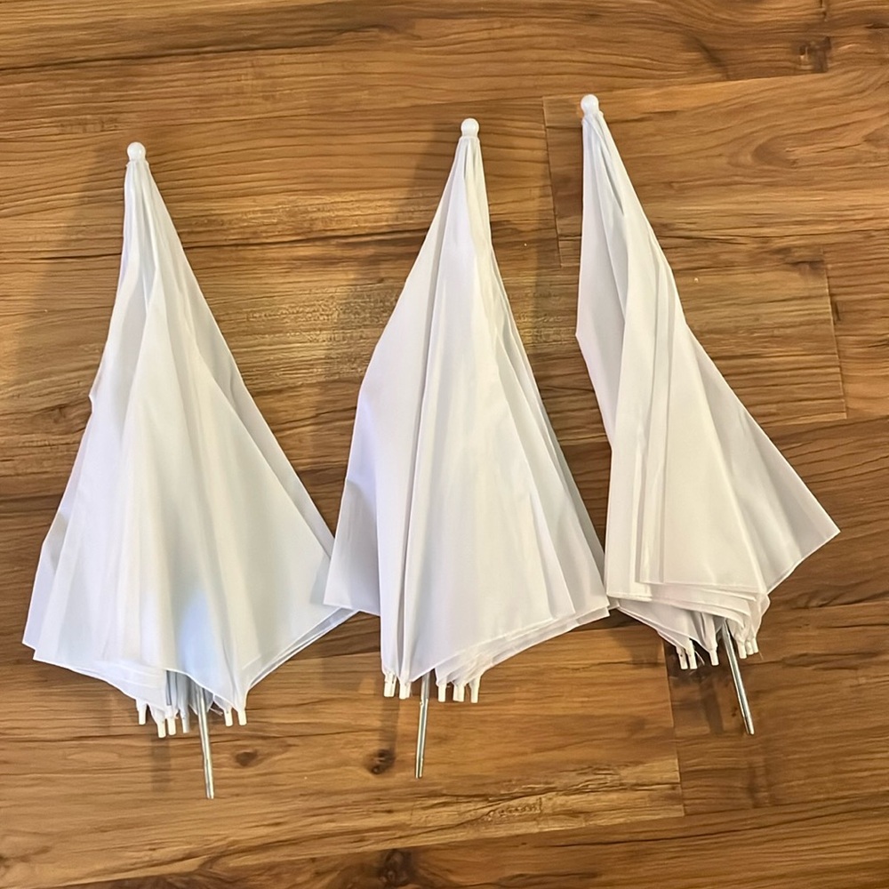 Three pack of photography umbrellas